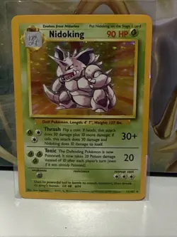 Nidoking 11/102 Pokemon Base Set Unlimited Holo Rare Card WOTC - Image 1