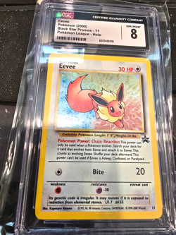 CGC 8 Eevee 2000 Black Star Promo 11 Holo SWIRL Pokemon Card psa - Image 1