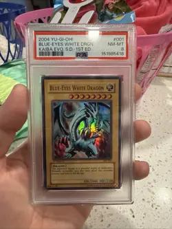 2004 Yu-Gi-Oh! Blue-Eyes White Dragon PSA 8 NM-MT SKE-001 1st Edition Super Rare - Image 1