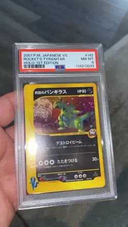 2001 POKEMON JAPANESE VS 1ST EDITION #142 ROCKET'S TYRANITAR-HOLO PSA 8 SWIRL 💫 - Image 1