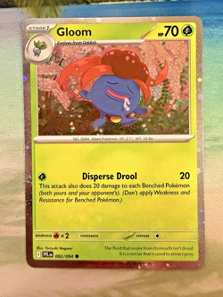 Gloom (Cosmos Holo) 002/094 ME02: Phantasmal Flames Pokemon Card NM - Image 1