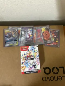 Pokemon Prismatic Evolutions Sealed booster + 8 Pokemon cards - Image 1
