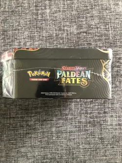 Pokemon TCG Paldean Fates Tin Sealed Charizard EX - Dented Tin - Image 4