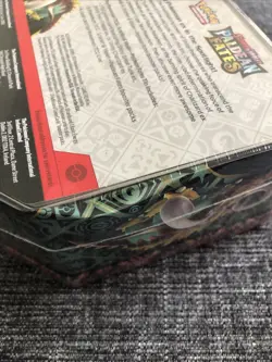 Pokemon TCG Paldean Fates Tin Sealed Charizard EX - Dented Tin - Image 5