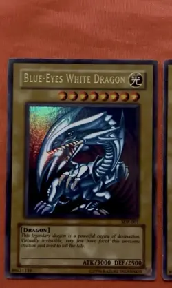 Konami Yu-Gi-Oh! 3-Card Lot: Blue-Eyes White Dragon x2 + Red-Eyes B. Dragon - Image 1
