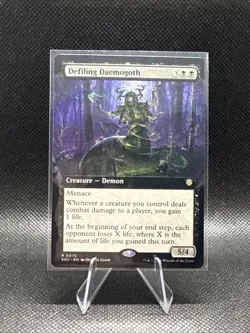 Defiling Daemogoth (Extended Art) Commander: Secrets of Strixhaven Regular - Image 1