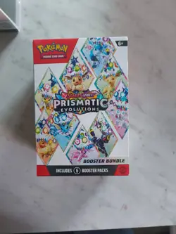 Pokemon TCG Scarlet Violet Prismatic Evolutions Booster Bundle, 6-Packs Sealed - Image 1