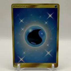 Pokemon Water Energy 124/111 Sun & Moon Crimson Invasion Gold Secret Rare - Image 1