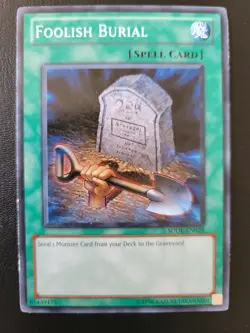 Foolish Burial SDDL-EN029 Yu-Gi-Oh Spell Card NM/LP Staple - Image 1