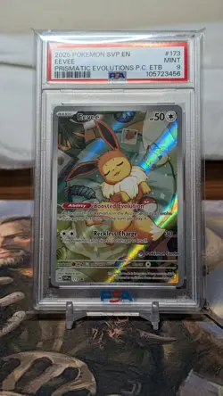 Pokemon - Prismatic Evolutions - PSA 9 Eevee 173 Pokemon Center Promo - Image 1