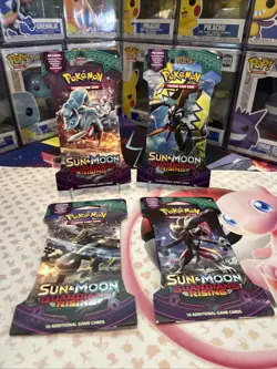 Pokemon TCG: Sun and Moon Guardians Rising Sleeved 4 Pack Complete Art Set - Image 1