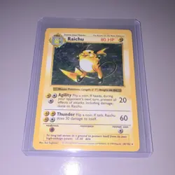 Pokemon TCG Raichu 14/102 Base Set Unlimited Holo Rare - Image 1