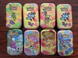 Pokemon Prismatic Envolution Mini Tin Set of 8 w/ Holo Cards - Image 1