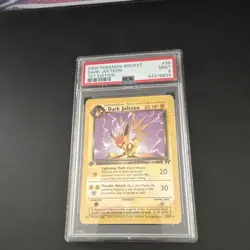 The Pokemon Company 2000 Team Rocket Dark Jolteon 1st Ed 38/82 PSA 9 - Image 1