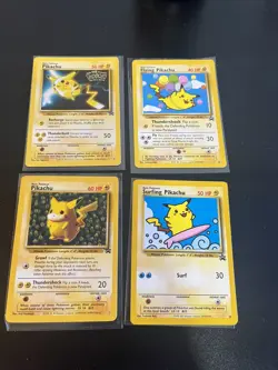 Pokemon Card LOT Flying Pikachu WOTC Black Star Promo surfing 25, 28, 4, and 1 - Image 1