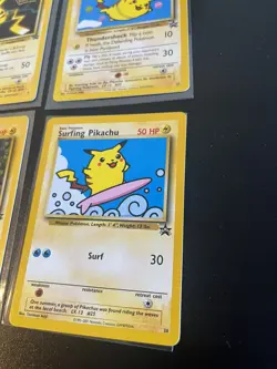 Pokemon Card LOT Flying Pikachu WOTC Black Star Promo surfing 25, 28, 4, and 1 - Image 3