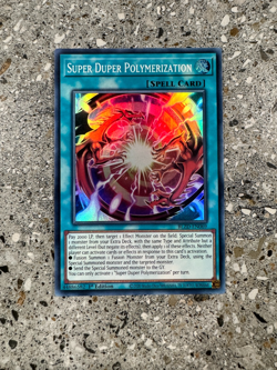 Yugioh TCG Super Duper Polymerization BLZD-EN069 Super Rare 1st Edition EU NM-M - Image 1