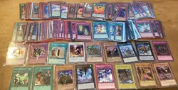 124 Yugioh Foil Card lot with duelist kingdom,magical hats,soul exchange & more - Image 1