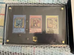 YuGiOh TCG 25th Anniversary Stainless Steel Egyptian God Cards - Image 1