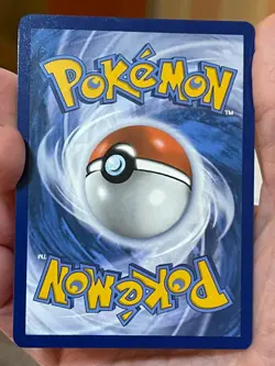 POKEMON STEELIX 125/182 RARE COSMOS HOLO BLEED WITH 3 SWIRL IN BORDER AREA NM - Image 2