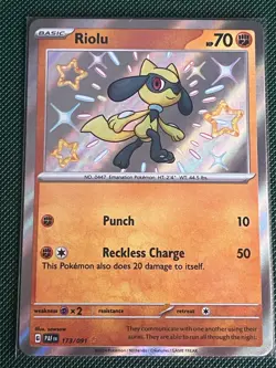 Pokemon TCG Riolu Card Paldean Fates Baby Shiny NM Condition 173/091 - Image 1
