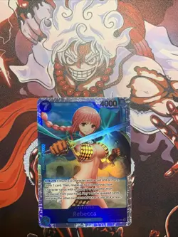 One Piece Card Game🏴‍☠COLOR: BLUE OP10-058 REBECCA SR FOIL NM TCG ENGLISH - Image 1