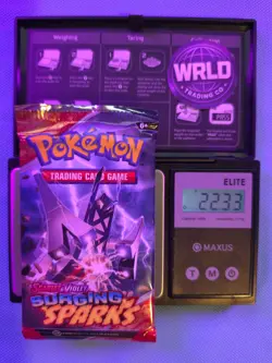 Weighed 22.33g Pokemon TCG Surging Sparks Booster Pack Sealed Heavy Weight - Image 1
