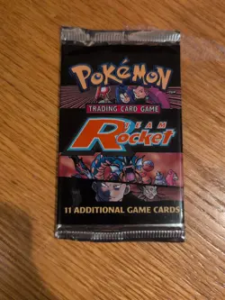 Wizards of the Coast Pokemon TCG Team Rocket Unlimited Booster Pack - Image 1