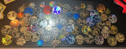 Lot of 70+ Official Pokemon Coins Various Sets! Pikachu Eevee Charizard + MORE - Image 1
