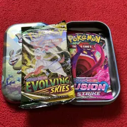 TWO PACKS POKEMON CARDS UNOPENED EVOLVING SKIES & FUSION STRIKE SEALED WITH TIN - Image 1