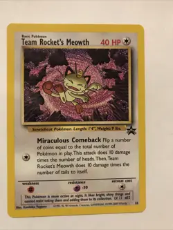 Team Rocket's Meowth Black Star Promo Pokemon Card #18 - Image 1