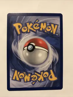 Team Rocket's Meowth Black Star Promo Pokemon Card #18 - Image 2