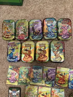 (9) Prismatic Evolutions Mini Tins set, Art Card + Coin NO CARDS Empty - Image 2