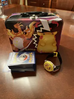 Pokemon 2020 Collector’s Chest Lunchbox Tin With Pokemon Cards/LCD Watch - Image 1