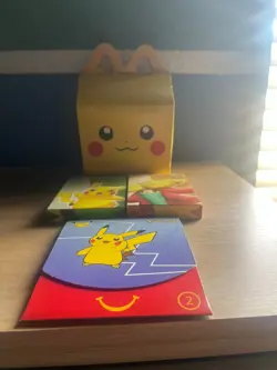 Pokemon Mcdonalds box and 3 packs of Unopended Pokemon Packs From Various Years - Image 1