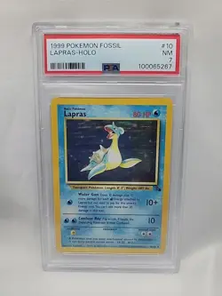 1999 POKEMON FOSSIL #10 LAPRAS-HOLO PSA 7 - Image 1