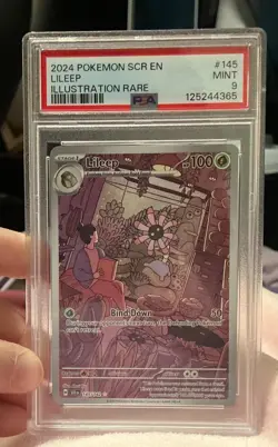 2024 Pokemon SCR EN Lileep 145/142 PSA 9 - Image 1