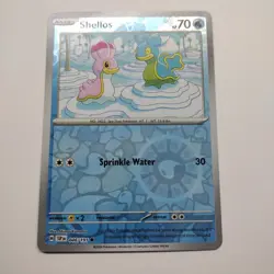 Pokemon Shellos 046/191 SV08: Surging Sparks Reverse Holo Pack Fresh - NM - Image 1