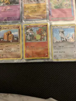 Pokemon TCG 27-Card Mixed Language Holo/Foil Graded Lot Charizard X EX - Image 4
