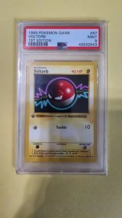 1st Ed Shadowless Voltorb 67/102 PSA 9 Mint Base Set Pokemon Card - Image 1