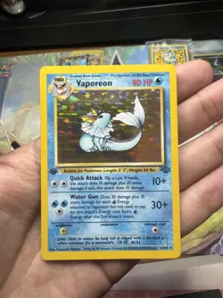 Pokemon TCG Vaporeon 1st Edition Holo Rare Card 12/64 Jungle 1999 MP/HP - Image 1