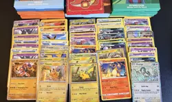 Pokemon TCG Pikachu Charizard Eevee Card Lot Unopened packs Over 50 Cards - Image 1