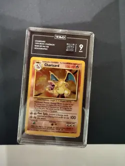 Pokemon Charizard Base Set Unlimited Holo Rare #4 TAG 9 Mint RANKED 13th Overall - Image 1
