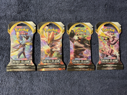 Pokemon TCG Sword Shield Rebel Clash SLEEVED booster packs sealed ART set of 4 - Image 1