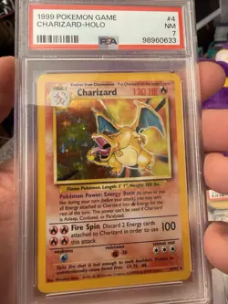 1999 POKEMON BASE SET UNLIMITED #4 CHARIZARD-HOLO PSA 7 - Image 1