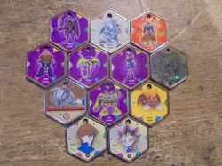 Yu Gi Oh! Lot of 12 Takahashi Metal Medallions Hexors Coins Tokens Battle Tiles - Image 1