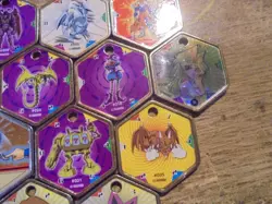 Yu Gi Oh! Lot of 12 Takahashi Metal Medallions Hexors Coins Tokens Battle Tiles - Image 3