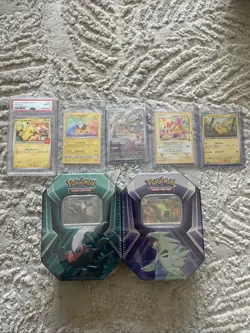 Mix Lot Of 5 Pikachu Cards + 2 Sealed Tins - Image 1