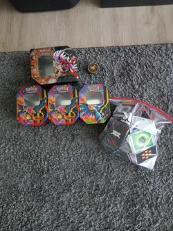 Lot Of 4 Pokemon Card Tins And 100s Of Bulk Tcg Cards - Image 1