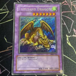 MRD-143 Thousand Dragon Secret Rare Yugioh Card - Image 1